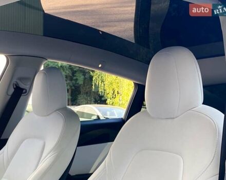 Синий Тесла Model Y, объемом двигателя 0 л и пробегом 92 тыс. км за 31999 $, фото 13 на Automoto.ua