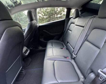 Синий Тесла Model Y, объемом двигателя 0 л и пробегом 52 тыс. км за 30900 $, фото 22 на Automoto.ua