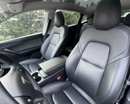 Синий Тесла Model Y, объемом двигателя 0 л и пробегом 52 тыс. км за 30900 $, фото 23 на Automoto.ua