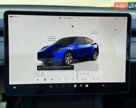 Синий Тесла Model Y, объемом двигателя 0 л и пробегом 80 тыс. км за 25300 $, фото 114 на Automoto.ua