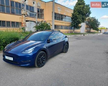 Синий Тесла Model Y, объемом двигателя 0 л и пробегом 44 тыс. км за 28000 $, фото 1 на Automoto.ua