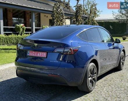 Синий Тесла Model Y, объемом двигателя 0 л и пробегом 80 тыс. км за 25300 $, фото 6 на Automoto.ua