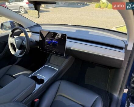 Синий Тесла Model Y, объемом двигателя 0 л и пробегом 80 тыс. км за 25300 $, фото 96 на Automoto.ua