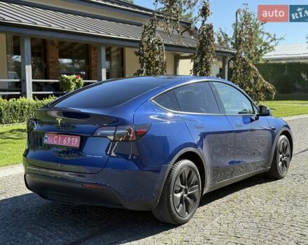 Синий Тесла Model Y, объемом двигателя 0 л и пробегом 80 тыс. км за 25300 $, фото 5 на Automoto.ua