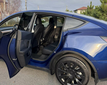 Синий Тесла Model Y, объемом двигателя 0 л и пробегом 52 тыс. км за 30900 $, фото 12 на Automoto.ua
