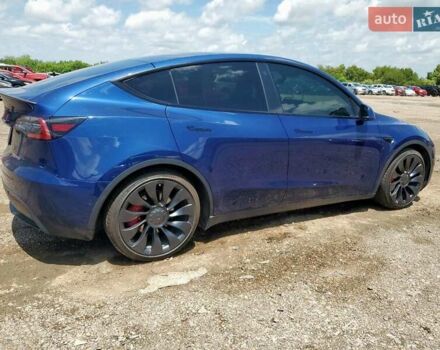 Синий Тесла Model Y, объемом двигателя 0 л и пробегом 81 тыс. км за 10500 $, фото 2 на Automoto.ua