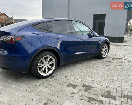 Синий Тесла Model Y, объемом двигателя 0 л и пробегом 86 тыс. км за 24900 $, фото 3 на Automoto.ua