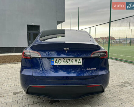 Синий Тесла Model Y, объемом двигателя 0 л и пробегом 86 тыс. км за 24900 $, фото 5 на Automoto.ua