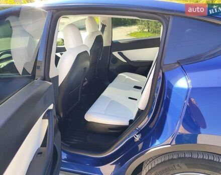 Синий Тесла Model Y, объемом двигателя 0 л и пробегом 63 тыс. км за 26800 $, фото 2 на Automoto.ua
