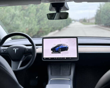Синий Тесла Model Y, объемом двигателя 0 л и пробегом 52 тыс. км за 30900 $, фото 31 на Automoto.ua