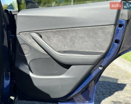 Синий Тесла Model Y, объемом двигателя 0 л и пробегом 80 тыс. км за 25300 $, фото 84 на Automoto.ua