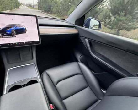 Синий Тесла Model Y, объемом двигателя 0 л и пробегом 52 тыс. км за 30900 $, фото 19 на Automoto.ua