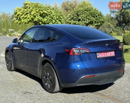 Синий Тесла Model Y, объемом двигателя 0 л и пробегом 80 тыс. км за 25300 $, фото 61 на Automoto.ua