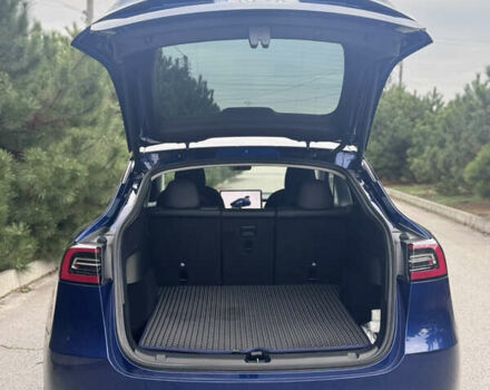 Синий Тесла Model Y, объемом двигателя 0 л и пробегом 52 тыс. км за 30900 $, фото 41 на Automoto.ua
