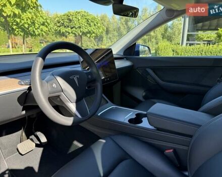 Синий Тесла Model Y, объемом двигателя 0 л и пробегом 80 тыс. км за 25300 $, фото 76 на Automoto.ua
