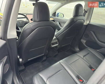 Синий Тесла Model Y, объемом двигателя 0 л и пробегом 66 тыс. км за 24100 $, фото 13 на Automoto.ua