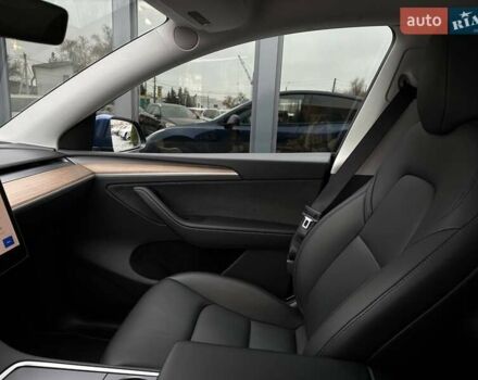 Синий Тесла Model Y, объемом двигателя 0 л и пробегом 10 тыс. км за 30494 $, фото 63 на Automoto.ua