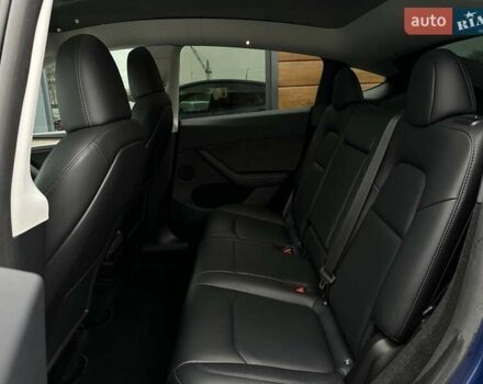 Синий Тесла Model Y, объемом двигателя 0 л и пробегом 10 тыс. км за 30494 $, фото 69 на Automoto.ua