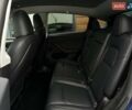 Синий Тесла Model Y, объемом двигателя 0 л и пробегом 10 тыс. км за 30494 $, фото 69 на Automoto.ua