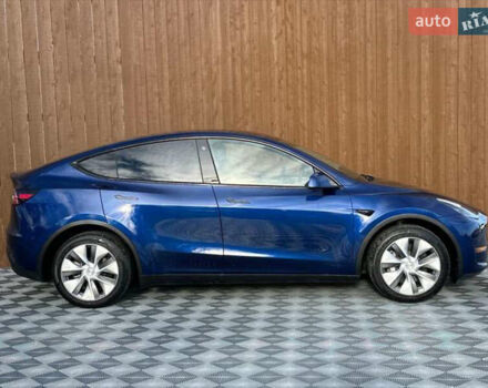Синий Тесла Model Y, объемом двигателя 0 л и пробегом 22 тыс. км за 26000 $, фото 1 на Automoto.ua