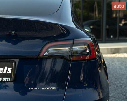 Синий Тесла Model Y, объемом двигателя 0 л и пробегом 79 тыс. км за 31900 $, фото 6 на Automoto.ua