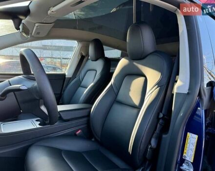 Синий Тесла Model Y, объемом двигателя 0 л и пробегом 48 тыс. км за 32990 $, фото 25 на Automoto.ua