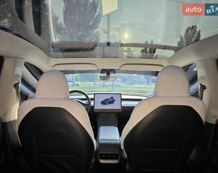 Синий Тесла Model Y, объемом двигателя 0 л и пробегом 51 тыс. км за 26400 $, фото 14 на Automoto.ua