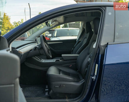 Синий Тесла Model Y, объемом двигателя 0 л и пробегом 79 тыс. км за 31900 $, фото 10 на Automoto.ua