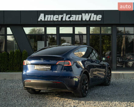 Синий Тесла Model Y, объемом двигателя 0 л и пробегом 79 тыс. км за 31900 $, фото 4 на Automoto.ua