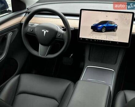 Синий Тесла Model Y, объемом двигателя 0 л и пробегом 10 тыс. км за 30494 $, фото 74 на Automoto.ua