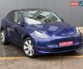 Синий Тесла Model Y, объемом двигателя 0 л и пробегом 82 тыс. км за 25900 $, фото 1 на Automoto.ua