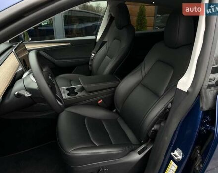 Синий Тесла Model Y, объемом двигателя 0 л и пробегом 10 тыс. км за 30494 $, фото 64 на Automoto.ua