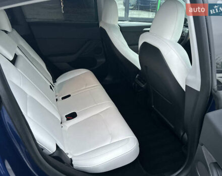 Синий Тесла Model Y, объемом двигателя 0 л и пробегом 48 тыс. км за 31600 $, фото 19 на Automoto.ua