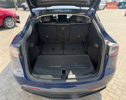 Синий Тесла Model Y, объемом двигателя 0 л и пробегом 71 тыс. км за 21700 $, фото 17 на Automoto.ua