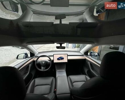 Синий Тесла Model Y, объемом двигателя 0 л и пробегом 10 тыс. км за 30494 $, фото 72 на Automoto.ua