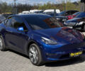 Синий Тесла Model Y, объемом двигателя 82 л и пробегом 28 тыс. км за 39800 $, фото 1 на Automoto.ua
