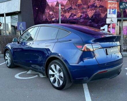 Синий Тесла Model Y, объемом двигателя 0 л и пробегом 48 тыс. км за 32990 $, фото 4 на Automoto.ua