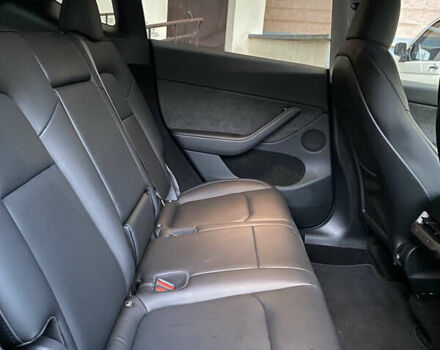 Синий Тесла Model Y, объемом двигателя 0 л и пробегом 15 тыс. км за 28200 $, фото 26 на Automoto.ua