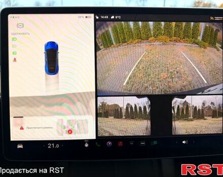 Синий Тесла Model Y, объемом двигателя 0 л и пробегом 46 тыс. км за 31900 $, фото 9 на Automoto.ua