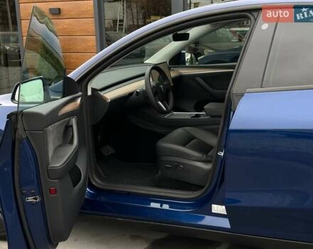 Синий Тесла Model Y, объемом двигателя 0 л и пробегом 10 тыс. км за 30494 $, фото 37 на Automoto.ua