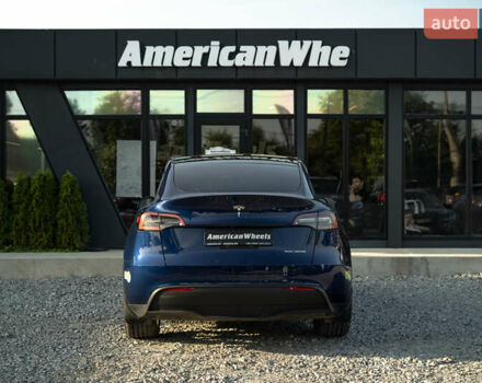 Синий Тесла Model Y, объемом двигателя 0 л и пробегом 79 тыс. км за 31900 $, фото 5 на Automoto.ua