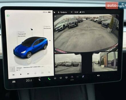 Синий Тесла Model Y, объемом двигателя 0 л и пробегом 10 тыс. км за 30494 $, фото 55 на Automoto.ua