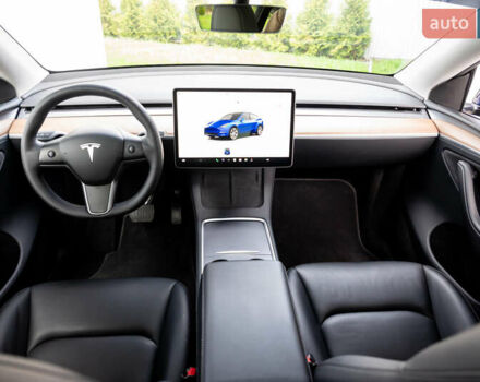 Синий Тесла Model Y, объемом двигателя 0 л и пробегом 55 тыс. км за 27200 $, фото 19 на Automoto.ua