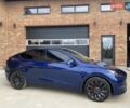 Синий Тесла Model Y, объемом двигателя 0 л и пробегом 24 тыс. км за 26900 $, фото 1 на Automoto.ua