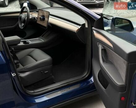 Синий Тесла Model Y, объемом двигателя 0 л и пробегом 10 тыс. км за 30494 $, фото 79 на Automoto.ua