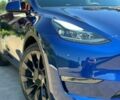 Синий Тесла Model Y, объемом двигателя 0 л и пробегом 100 тыс. км за 23850 $, фото 1 на Automoto.ua