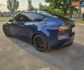 Синий Тесла Model Y, объемом двигателя 0 л и пробегом 51 тыс. км за 26400 $, фото 2 на Automoto.ua