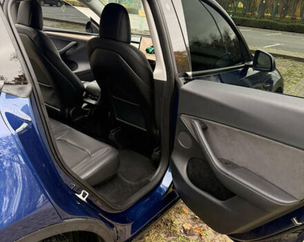 Синий Тесла Model Y, объемом двигателя 0 л и пробегом 46 тыс. км за 31900 $, фото 11 на Automoto.ua
