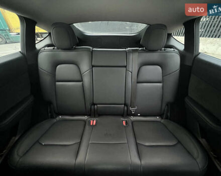 Синій Тесла Model Y, об'ємом двигуна 0 л та пробігом 145 тис. км за 21999 $, фото 26 на Automoto.ua