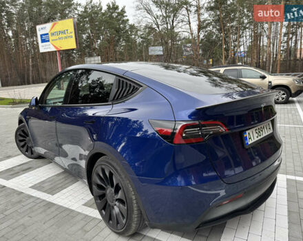 Синий Тесла Model Y, объемом двигателя 0 л и пробегом 18 тыс. км за 31200 $, фото 11 на Automoto.ua